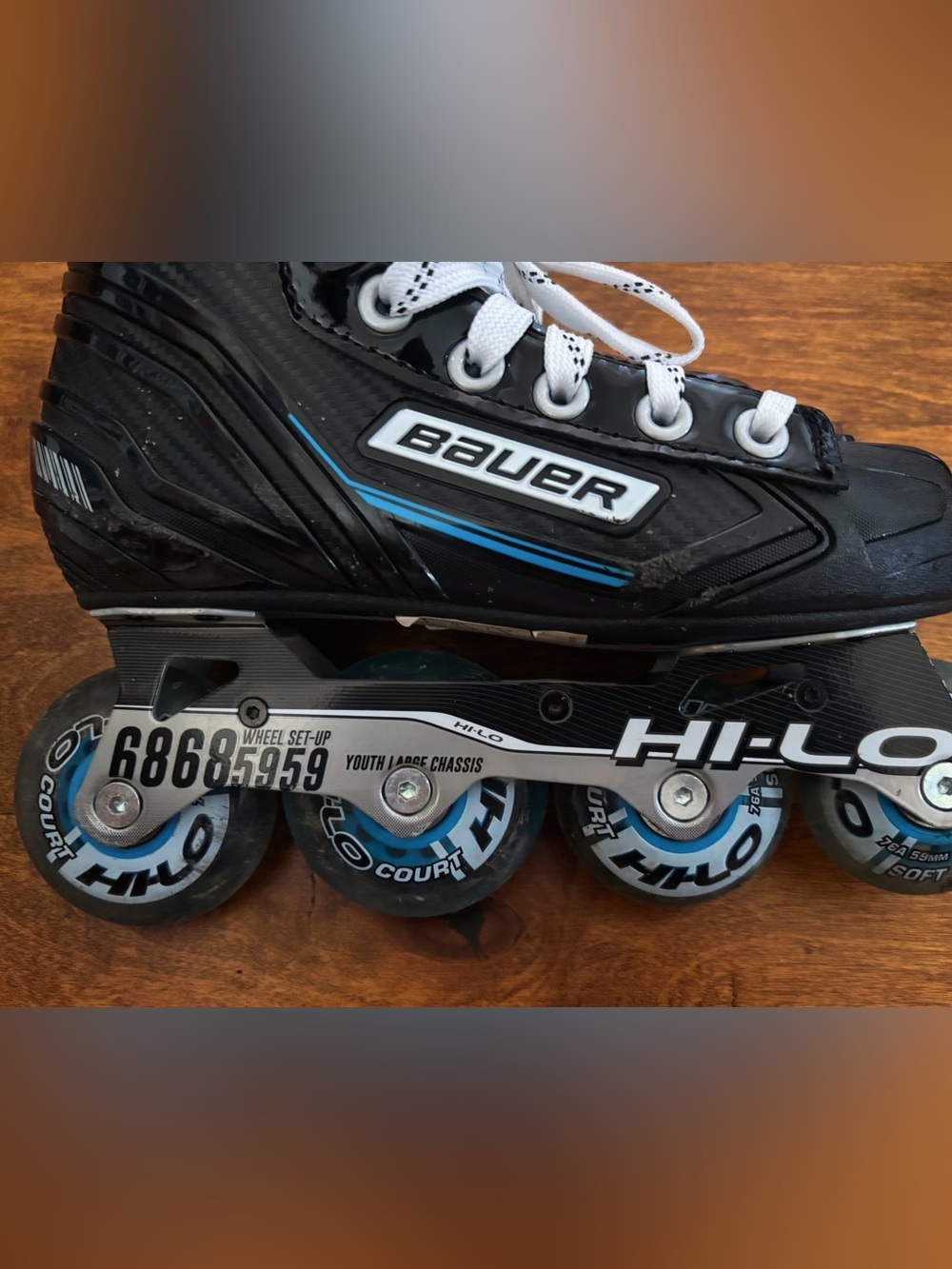 Bauer Black and Blue Inline Hockey Skates with White Laces - Picture 2 of 5